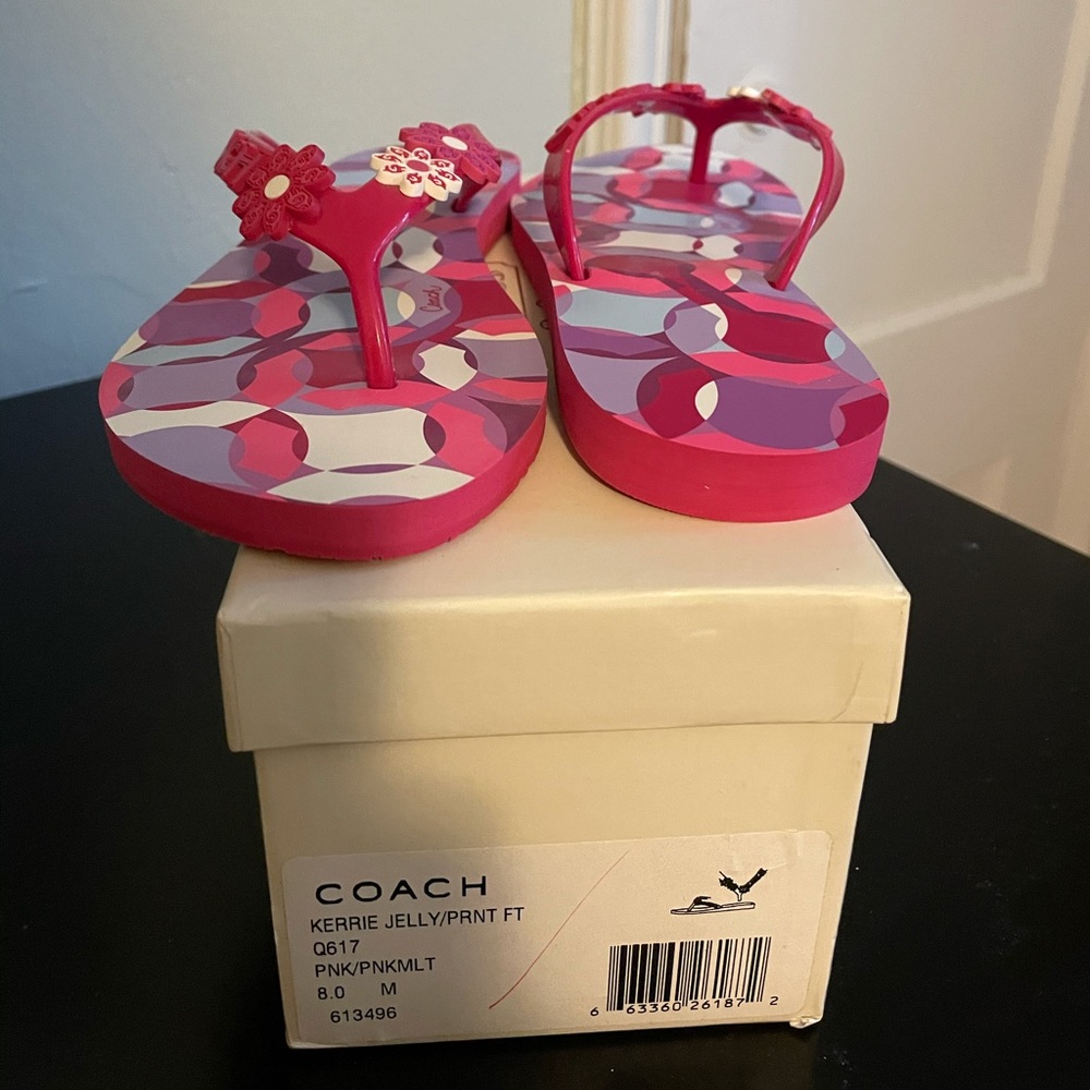Never worn Coach Flip flops